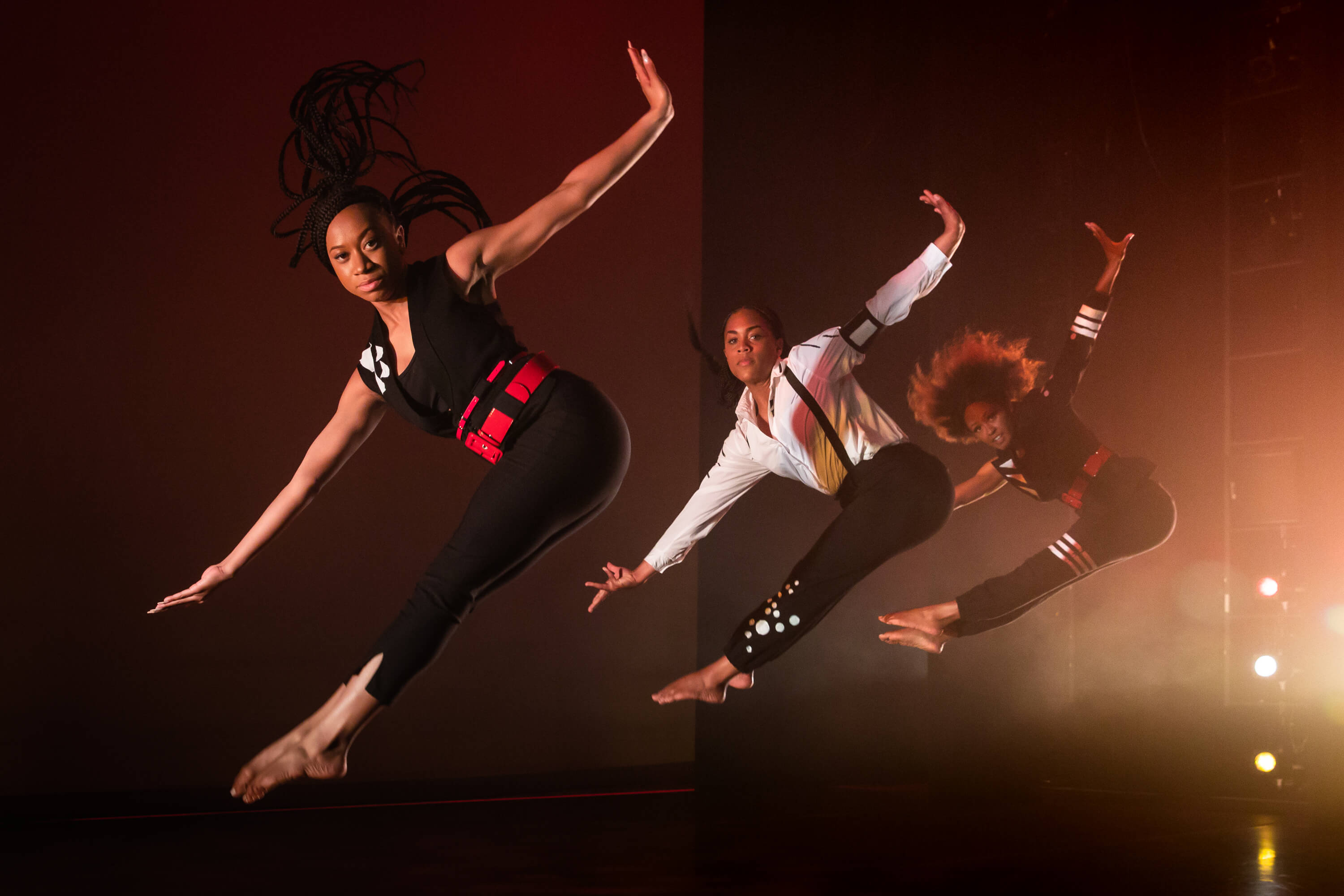 dancers jumping at an angle